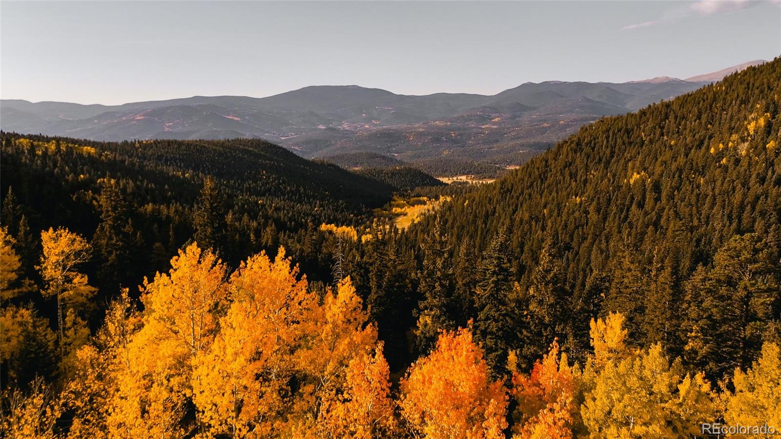 950 Corral Creek Road Evergreen, CO 80439 - Photo 50 of 50 a view of mountain with a street
