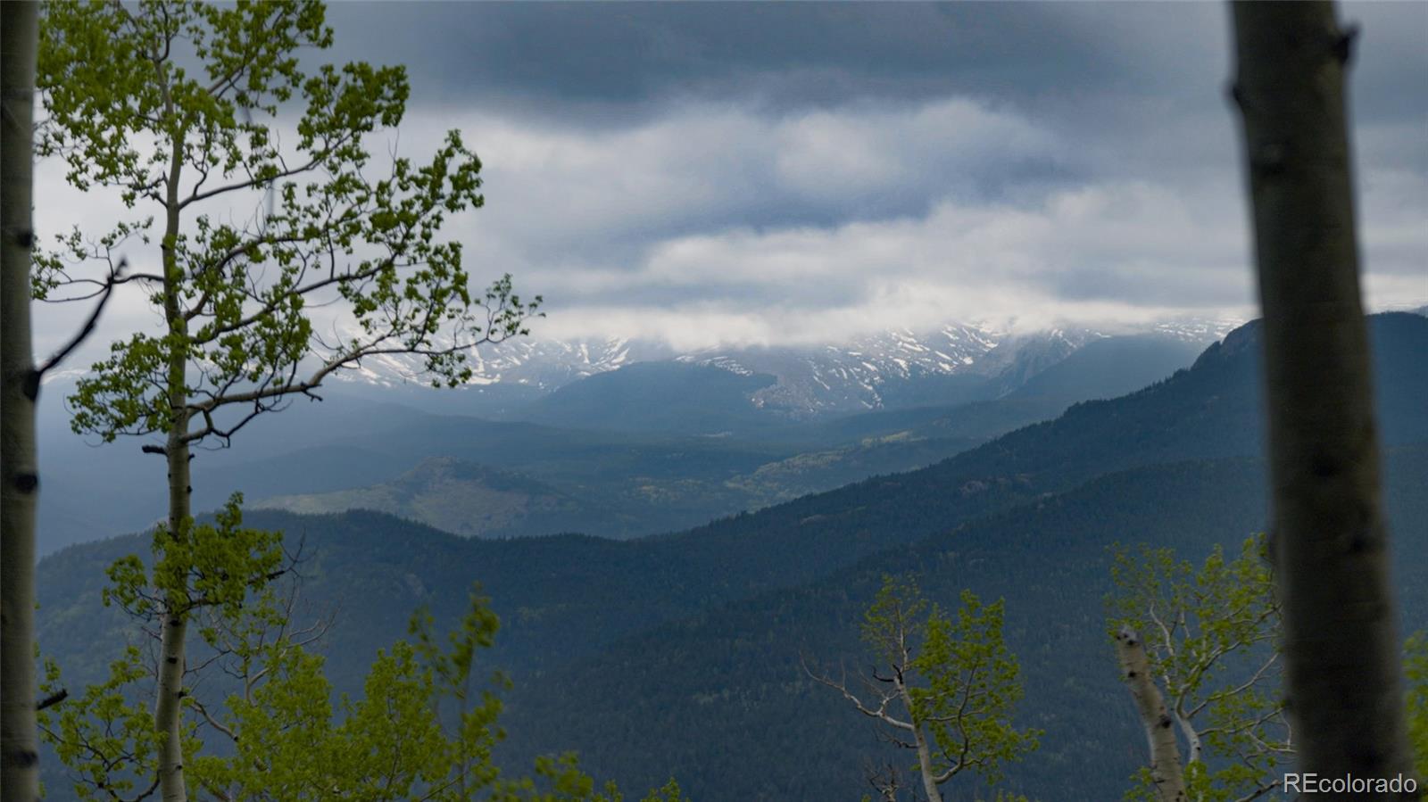 950 Corral Creek Road Evergreen, CO 80439 - Photo 9 of 50 a view of a house