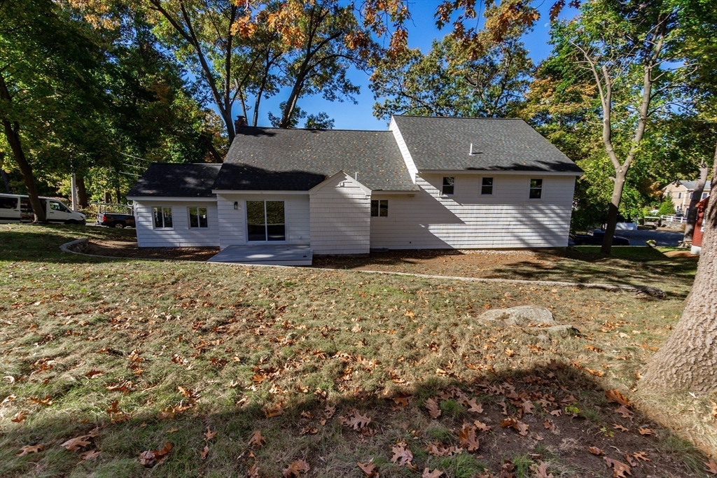72 Outlook Road Wakefield, MA 01880 - Photo 34 of 42 front view of a house with a yard