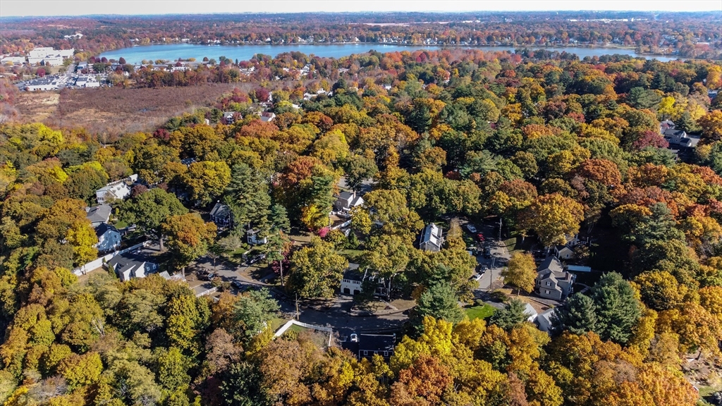 72 Outlook Road Wakefield, MA 01880 - Photo 39 of 42 an aerial view of a houses with a lush green hillside