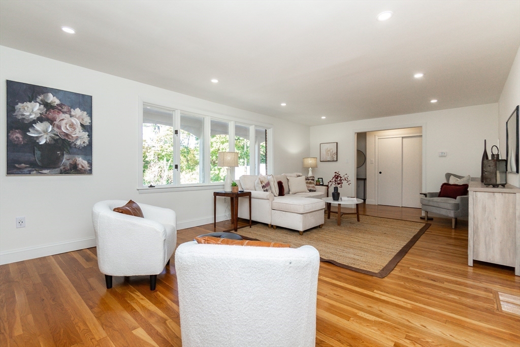 72 Outlook Road Wakefield, MA 01880 - Photo 9 of 42 a living room with furniture and a large window