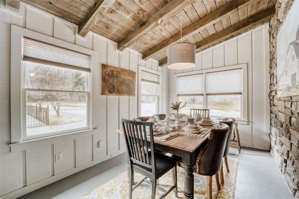 226 Vinson Mountain Road Rockmart, GA 30153 - Photo 15 of 35 a view of a dining room with furniture window and outside view