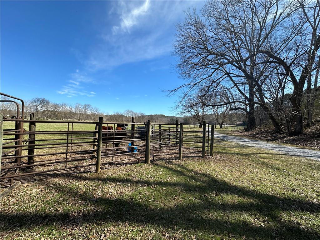 226 Vinson Mountain Road Rockmart, GA 30153 - Photo 35 of 35 a view of a pathway with a building in the background