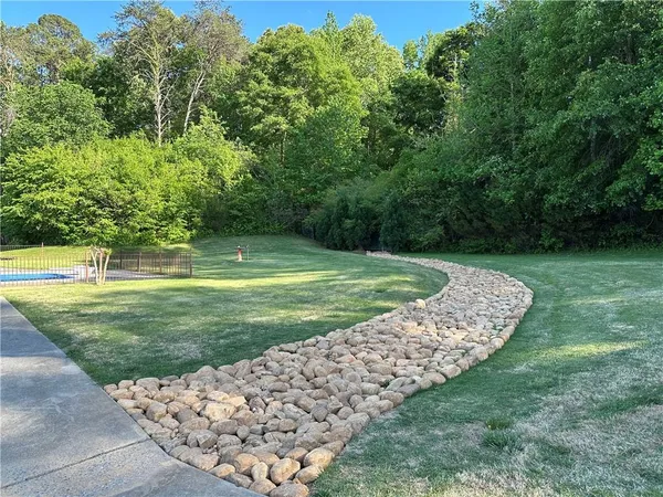 a view of a golf course with a garden