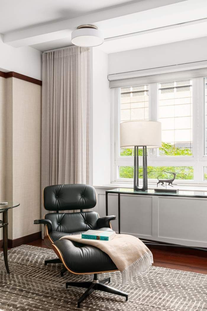 333 West 57th Street, Unit 3CD Manhattan, NY 10019 - Photo 15 of 24 a living room with furniture and a window