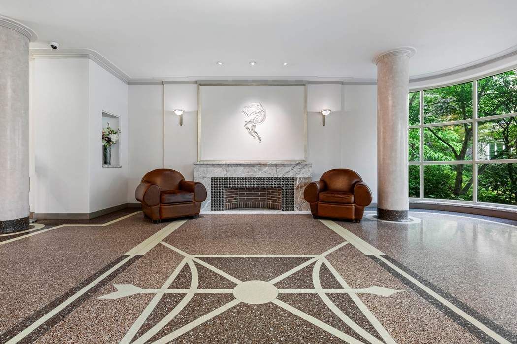 333 West 57th Street, Unit 3CD Manhattan, NY 10019 - Photo 23 of 24 a living room with furniture a window and potted plants