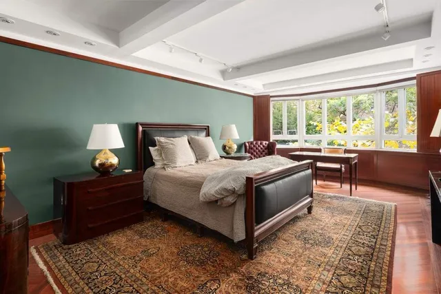 a kitchen with stainless steel appliances granite countertop a sink and stove top oven