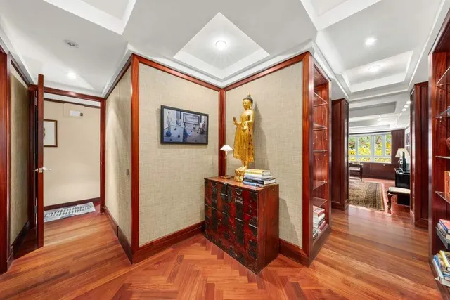 a reading room with furniture and a window