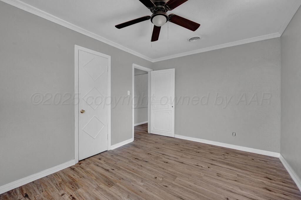 4360 South Polk Street Amarillo, TX 79110 - Photo 15 of 20 a view of room window and wooden floor