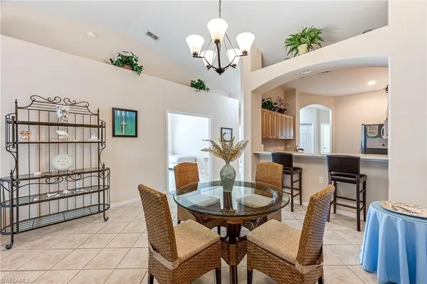 a view of a dining room with furniture