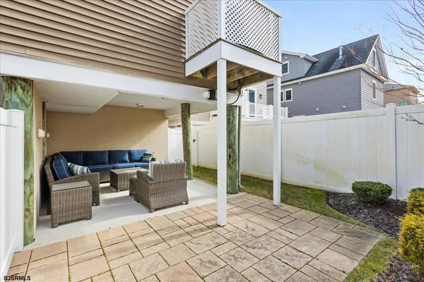 a backyard of a house with seating space