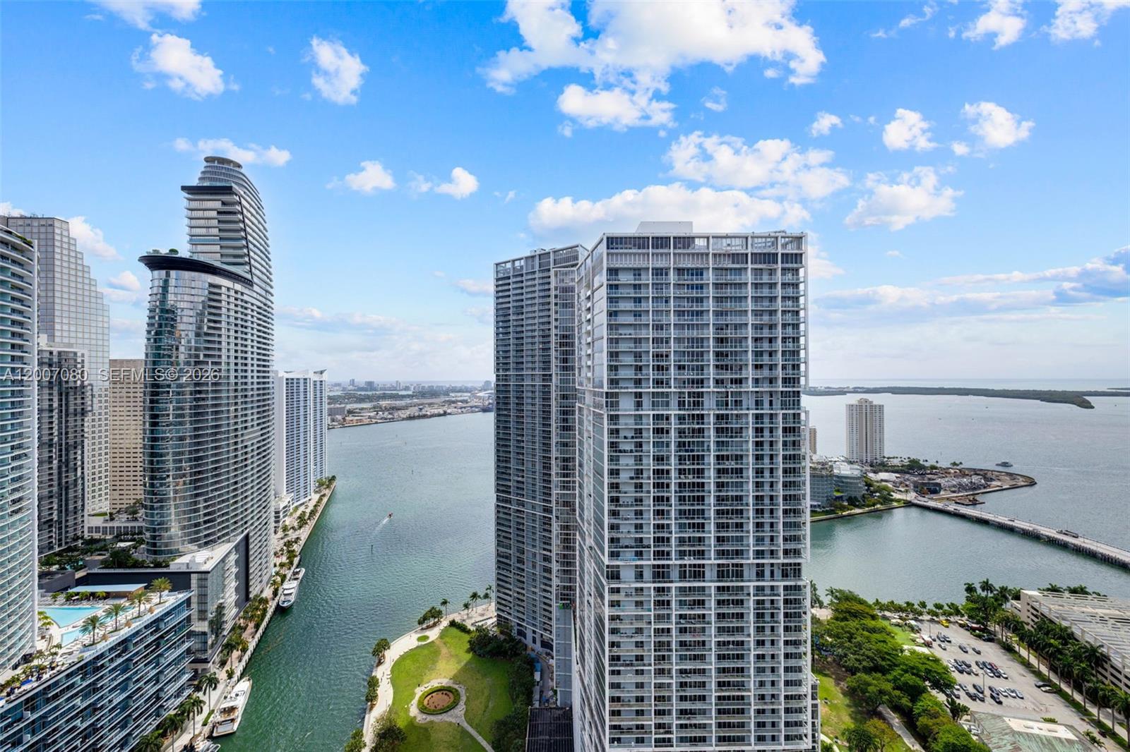 77 Southeast 5th Street, Unit PH01 Miami, FL 33131 - Photo 13 of 31 a view of a city with tall buildings