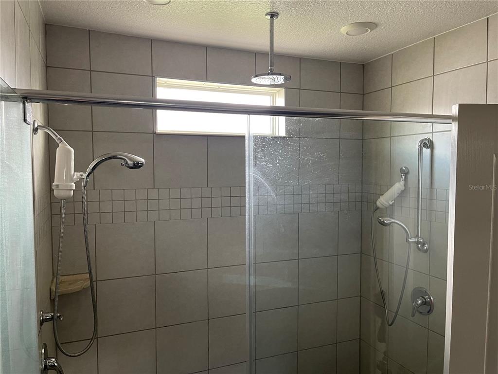 1312 Ralph Poe Drive Apopka, FL 32703 - Photo 11 of 14 a bathroom with a shower