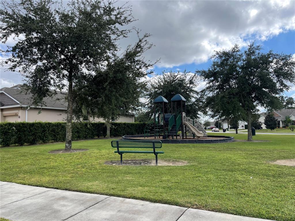 1312 Ralph Poe Drive Apopka, FL 32703 - Photo 3 of 14 a view of a park with trees