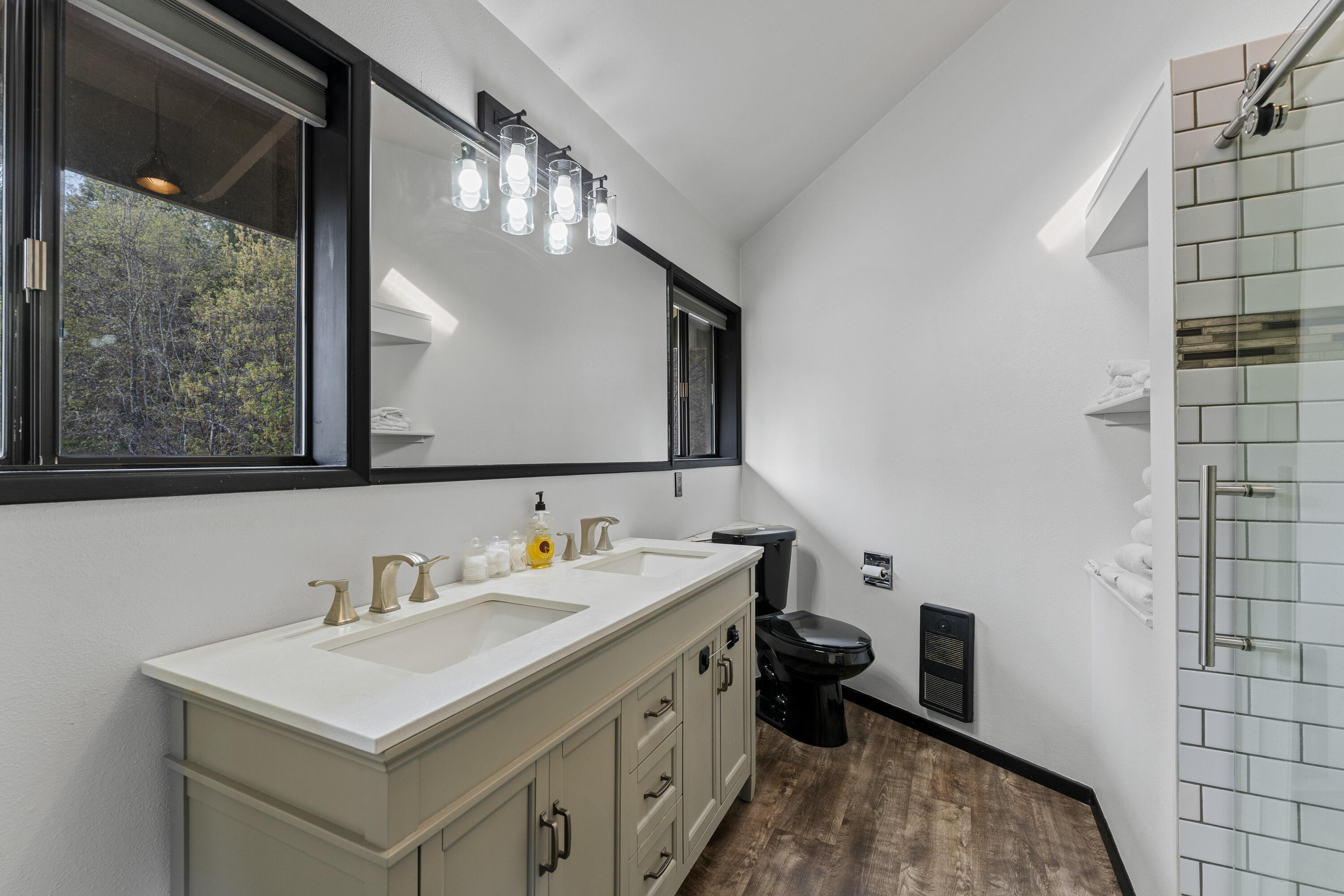 7201 Crowfoot Road Trail, OR 97541 - Photo 22 of 56 a bathroom with a sink vanity and a mirror