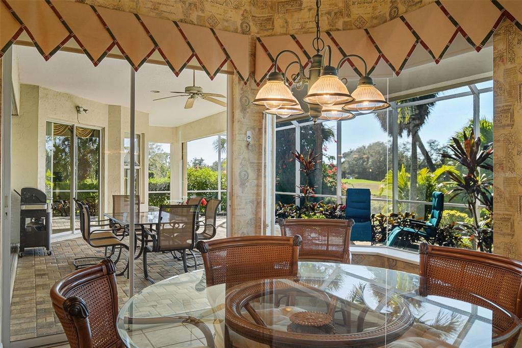 2116 Muskogee Trail Nokomis, FL 34275 - Photo 33 of 62 a living room with furniture and a large window