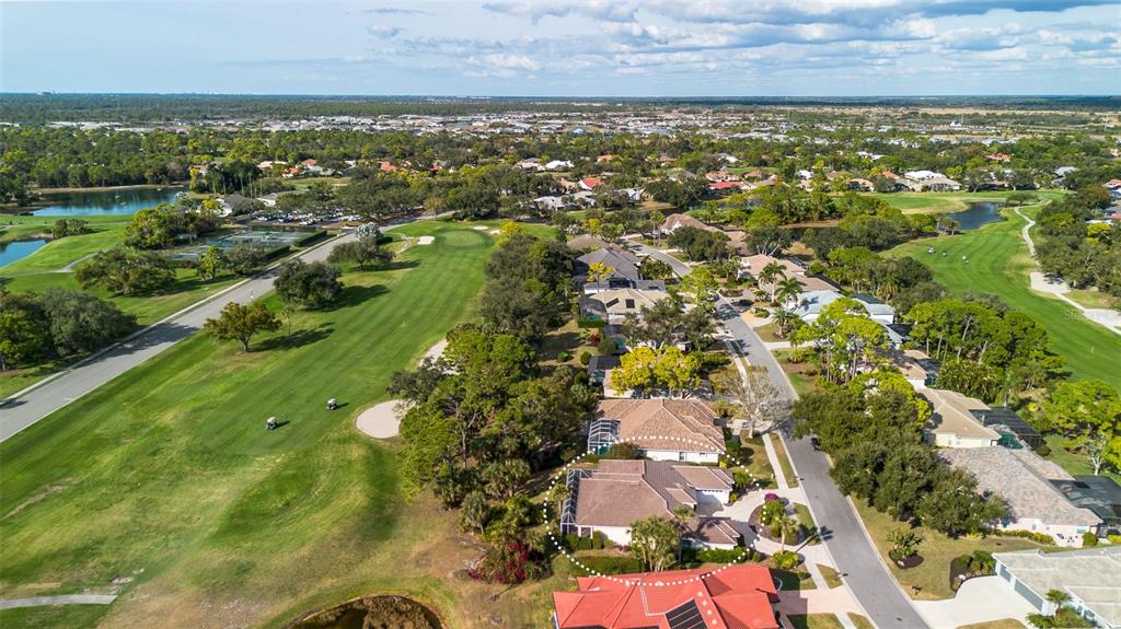 2116 Muskogee Trail Nokomis, FL 34275 - Photo 6 of 62 an aerial view of residential houses with outdoor space