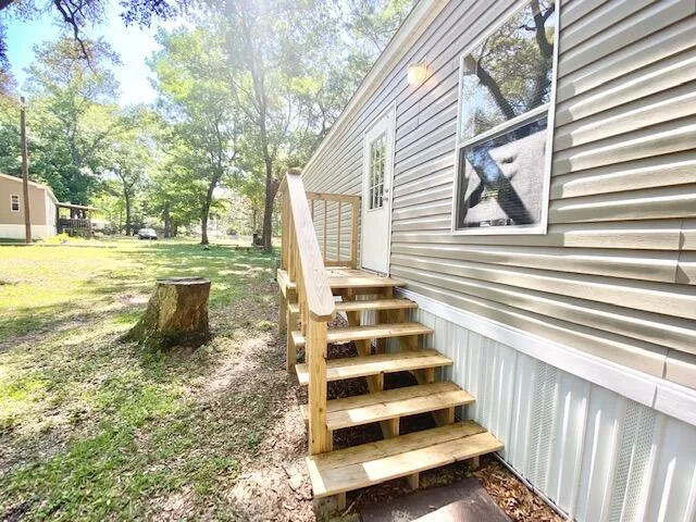 a view of a back yard of the house