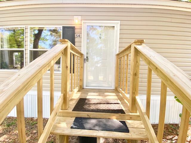 54 Tomahawk Street Niceville, FL 32578 - Photo 2 of 19 a view of a balcony