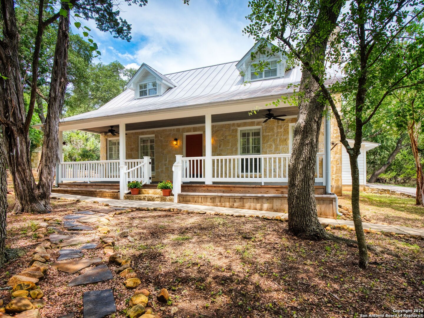 a house with trees in the background