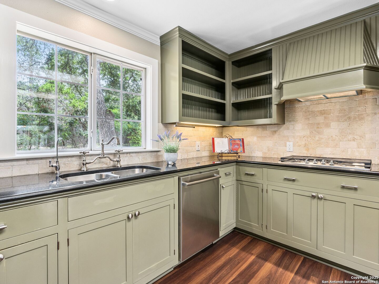 146-144 Ranger Creek Road Boerne, TX 78006 - Photo 11 of 50 a kitchen with granite countertop stainless steel appliances a sink and cabinets