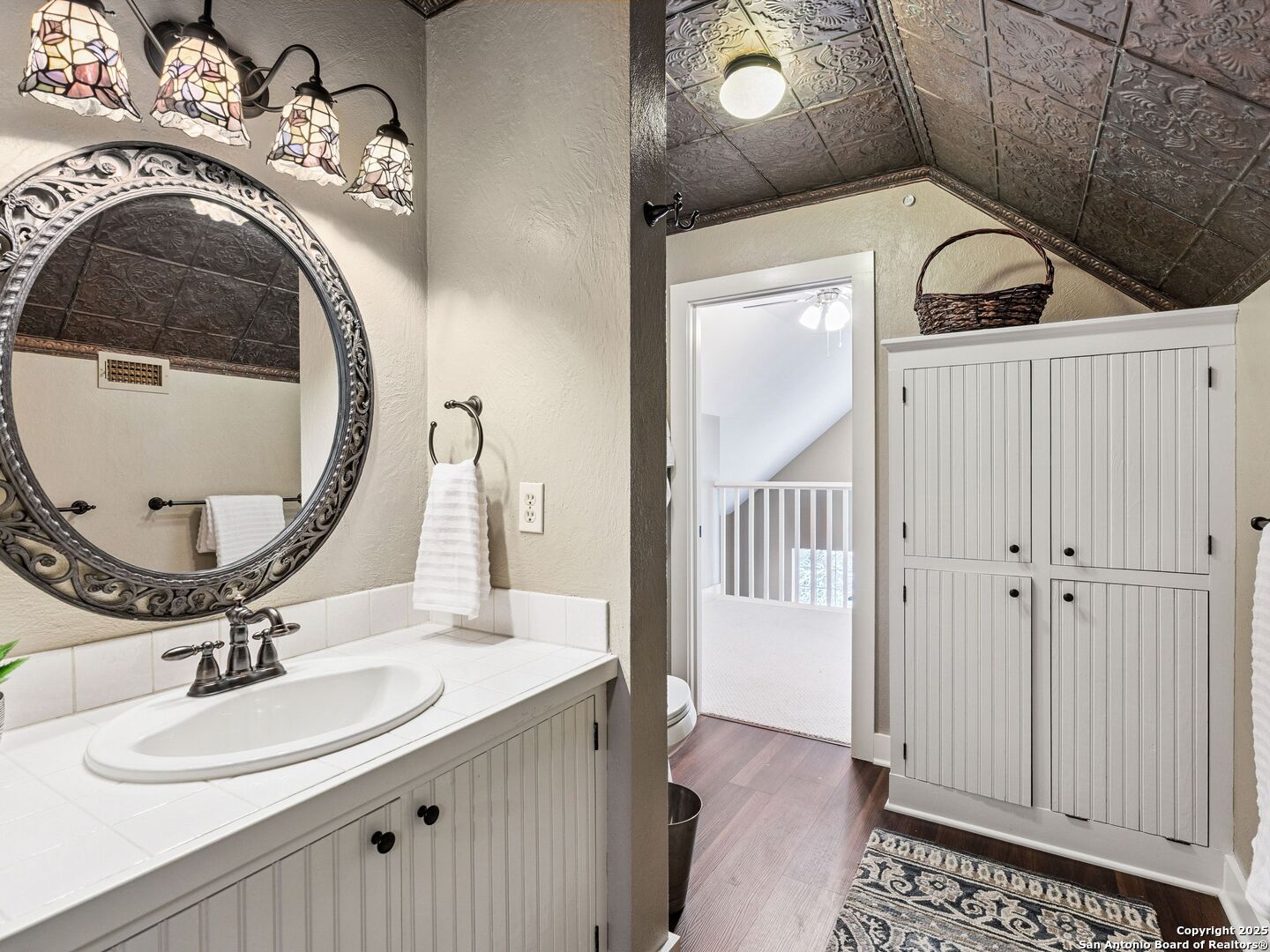 146-144 Ranger Creek Road Boerne, TX 78006 - Photo 19 of 50 a bathroom with a sink a mirror and a shower