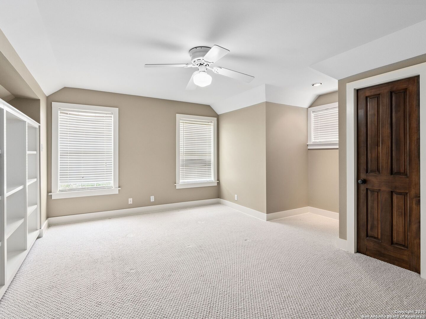 146-144 Ranger Creek Road Boerne, TX 78006 - Photo 20 of 50 a view of an empty room with window closet area and chandelier fan