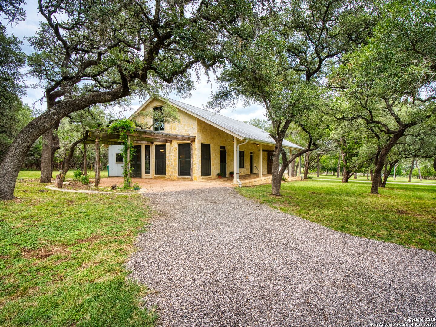 146-144 Ranger Creek Road Boerne, TX 78006 - Photo 25 of 50 a front view of a house with yard and green space