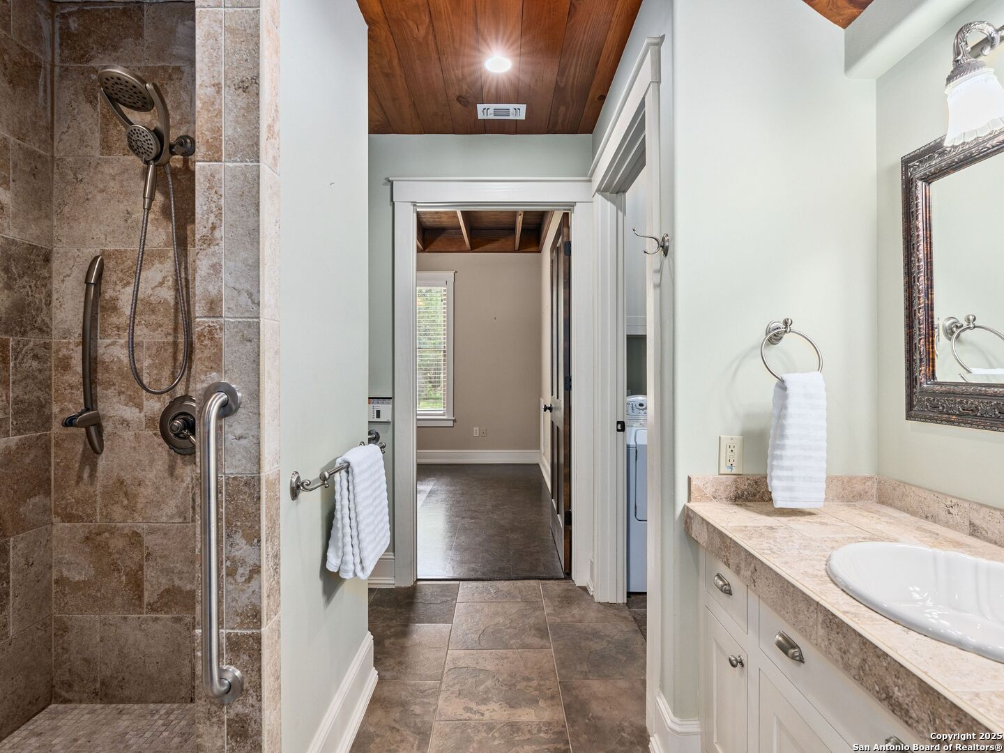 146-144 Ranger Creek Road Boerne, TX 78006 - Photo 41 of 50 a bathroom with a granite countertop shower sink and mirror