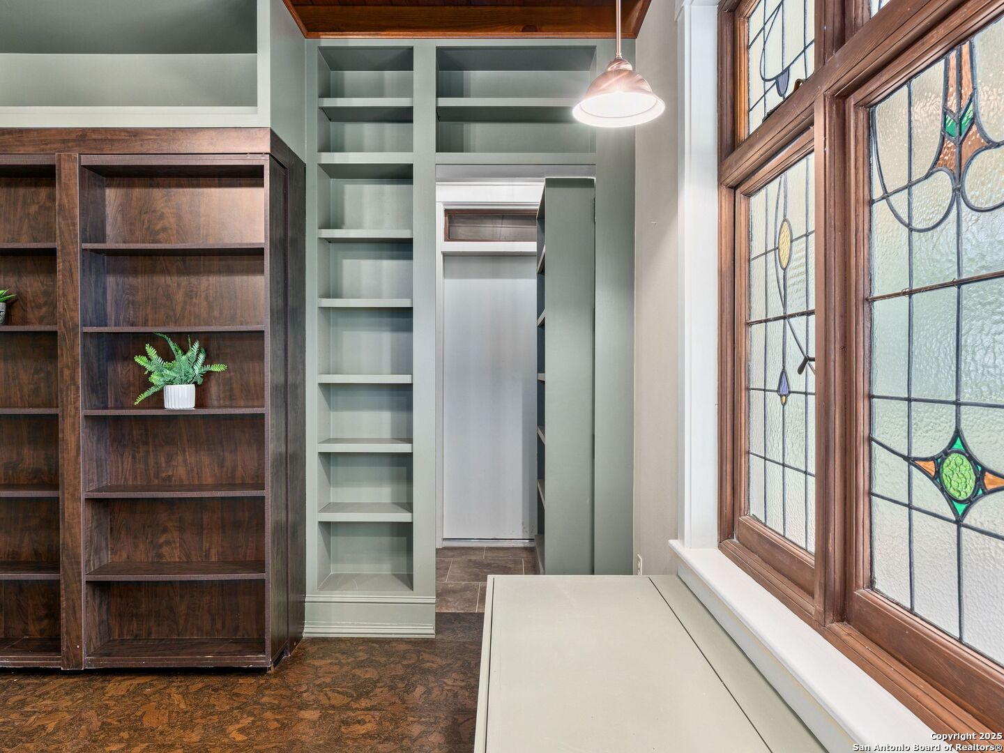 146-144 Ranger Creek Road Boerne, TX 78006 - Photo 42 of 50 a view of bedroom with a large window and cabinet