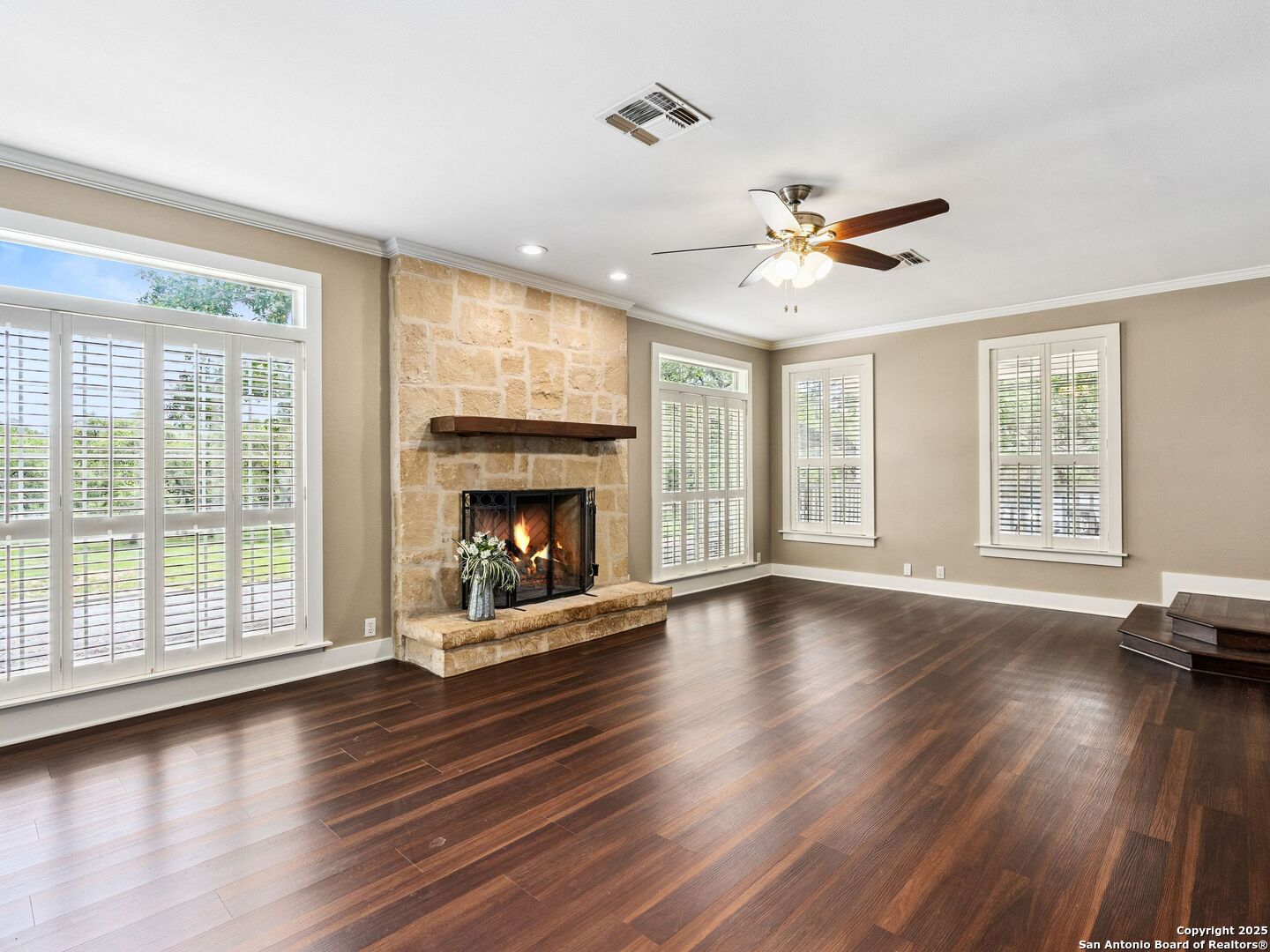 146-144 Ranger Creek Road Boerne, TX 78006 - Photo 6 of 50 a view of an empty room with wooden floor and a fireplace