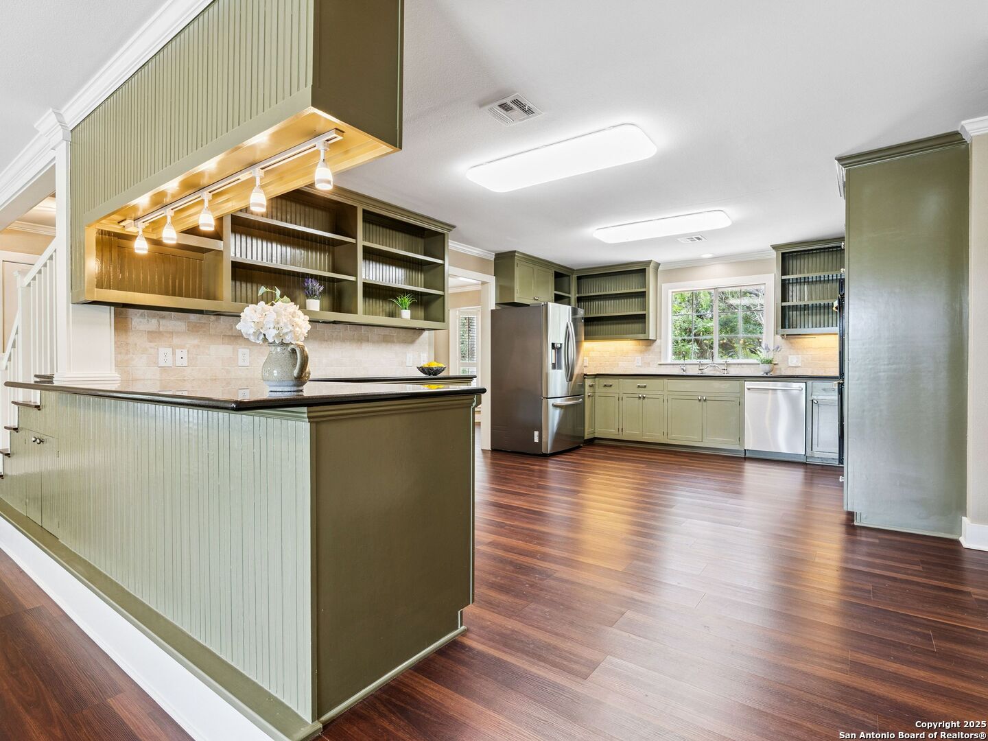 146-144 Ranger Creek Road Boerne, TX 78006 - Photo 8 of 50 a kitchen with stainless steel appliances granite countertop a refrigerator and a stove