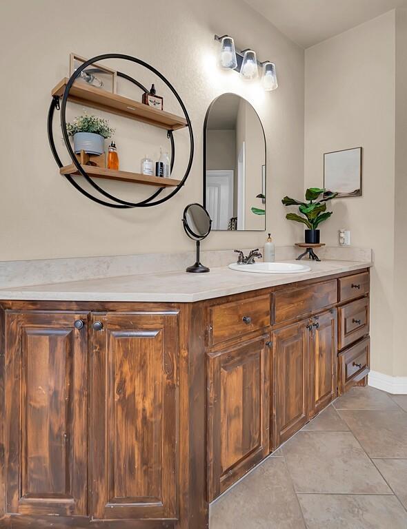550 Hunton Lane Robinson, TX 76706 - Photo 17 of 35 Bathroom with vanity and tile patterned floors