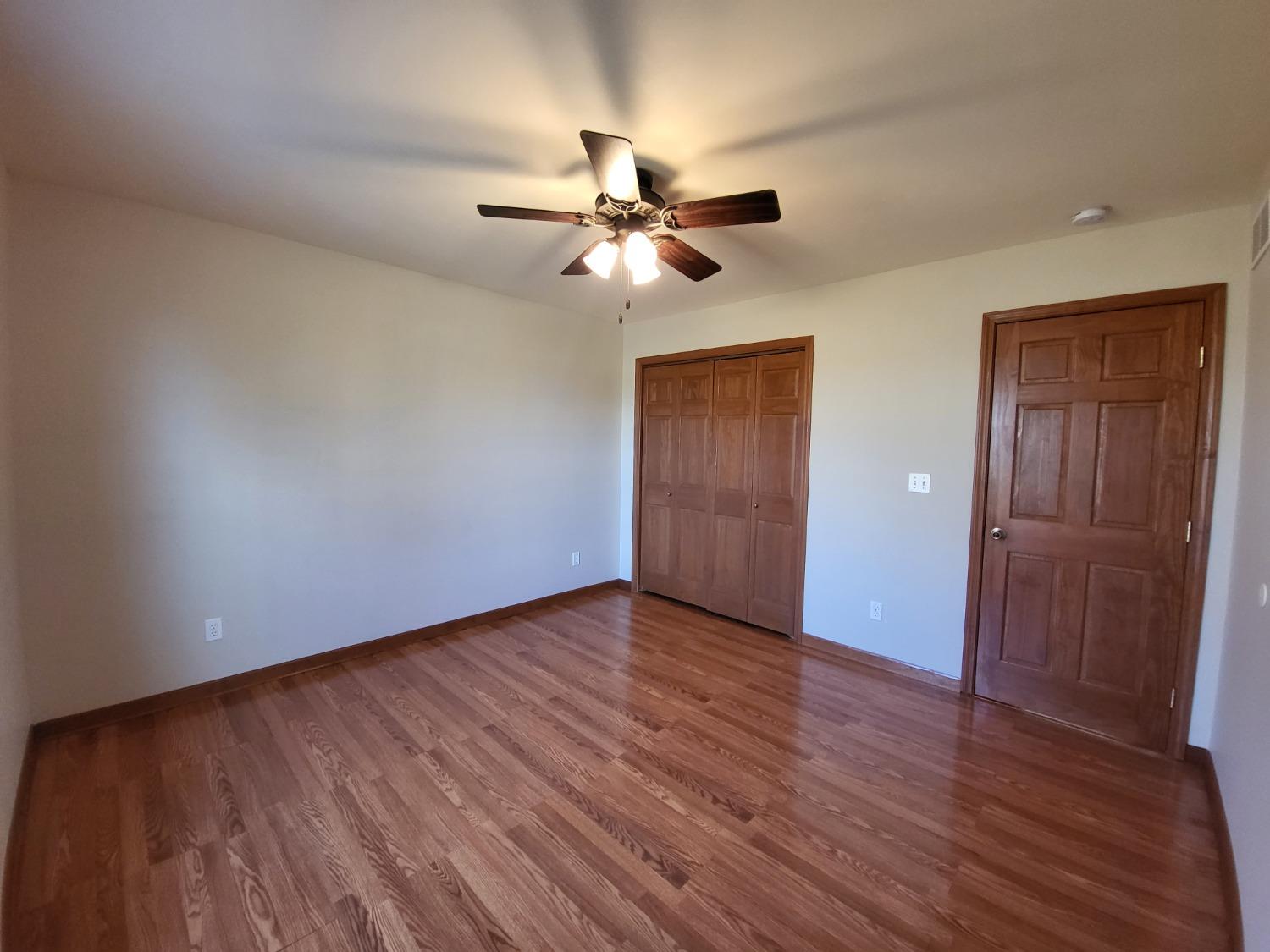 412 Juniper Street Northwest De Motte, IN 46310 - Photo 21 of 23 a view of an empty room and wooden floor