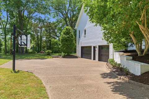 a front view of a house with outdoor space