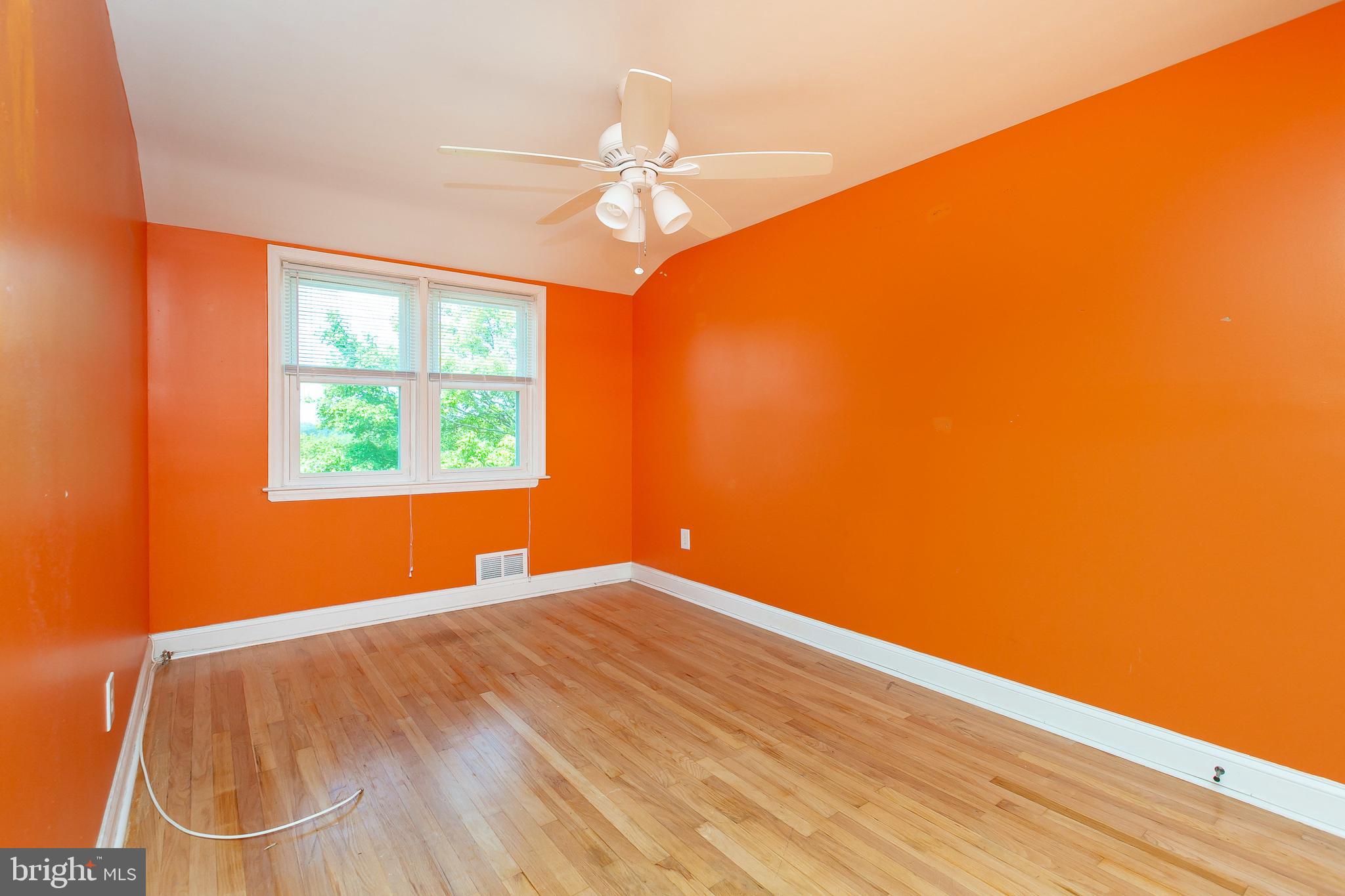 4921 St Gemma Road Baltimore, MD 21229 - Photo 18 of 33 a view of empty room with wooden floor