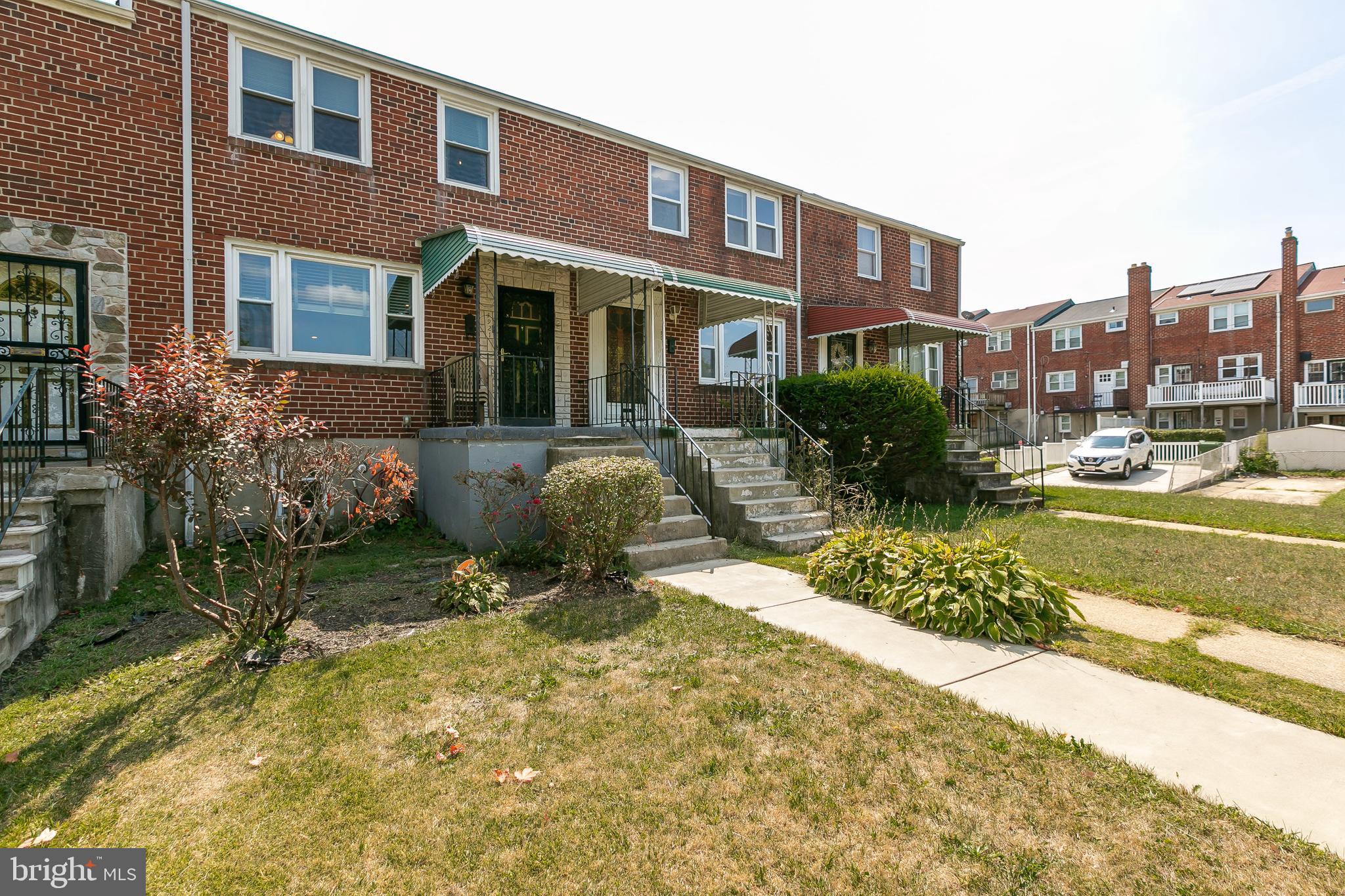 4921 St Gemma Road Baltimore, MD 21229 - Photo 3 of 33 a view of a house with a yard