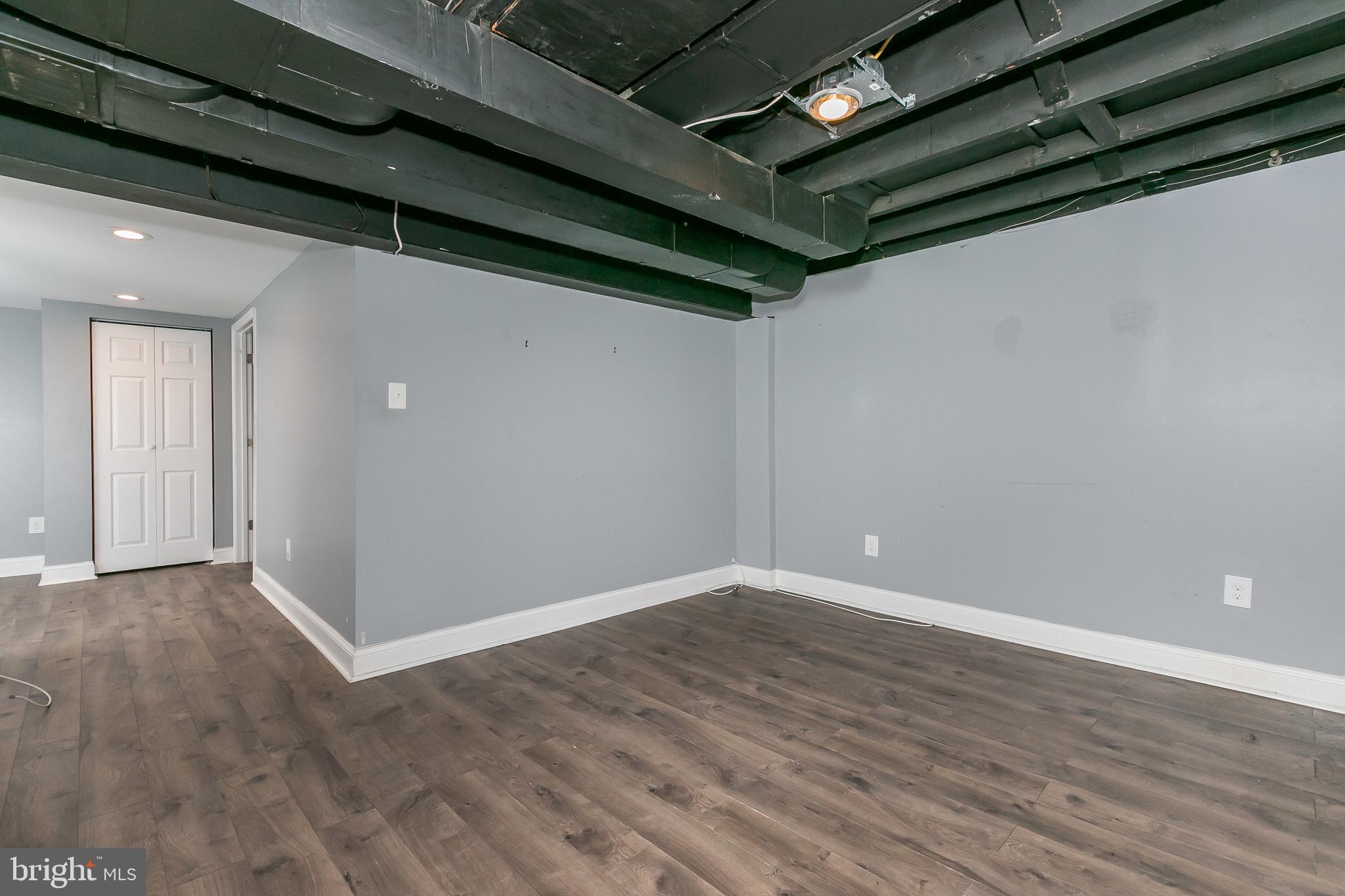 4921 St Gemma Road Baltimore, MD 21229 - Photo 25 of 33 wooden floor in an empty room