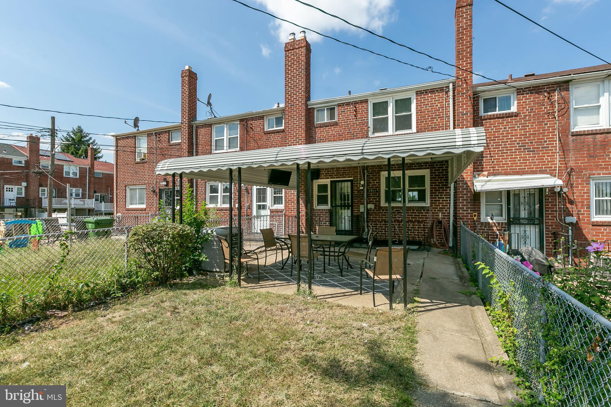 4921 St Gemma Road Baltimore, MD 21229 - Photo 29 of 33 a front view of a house with garden