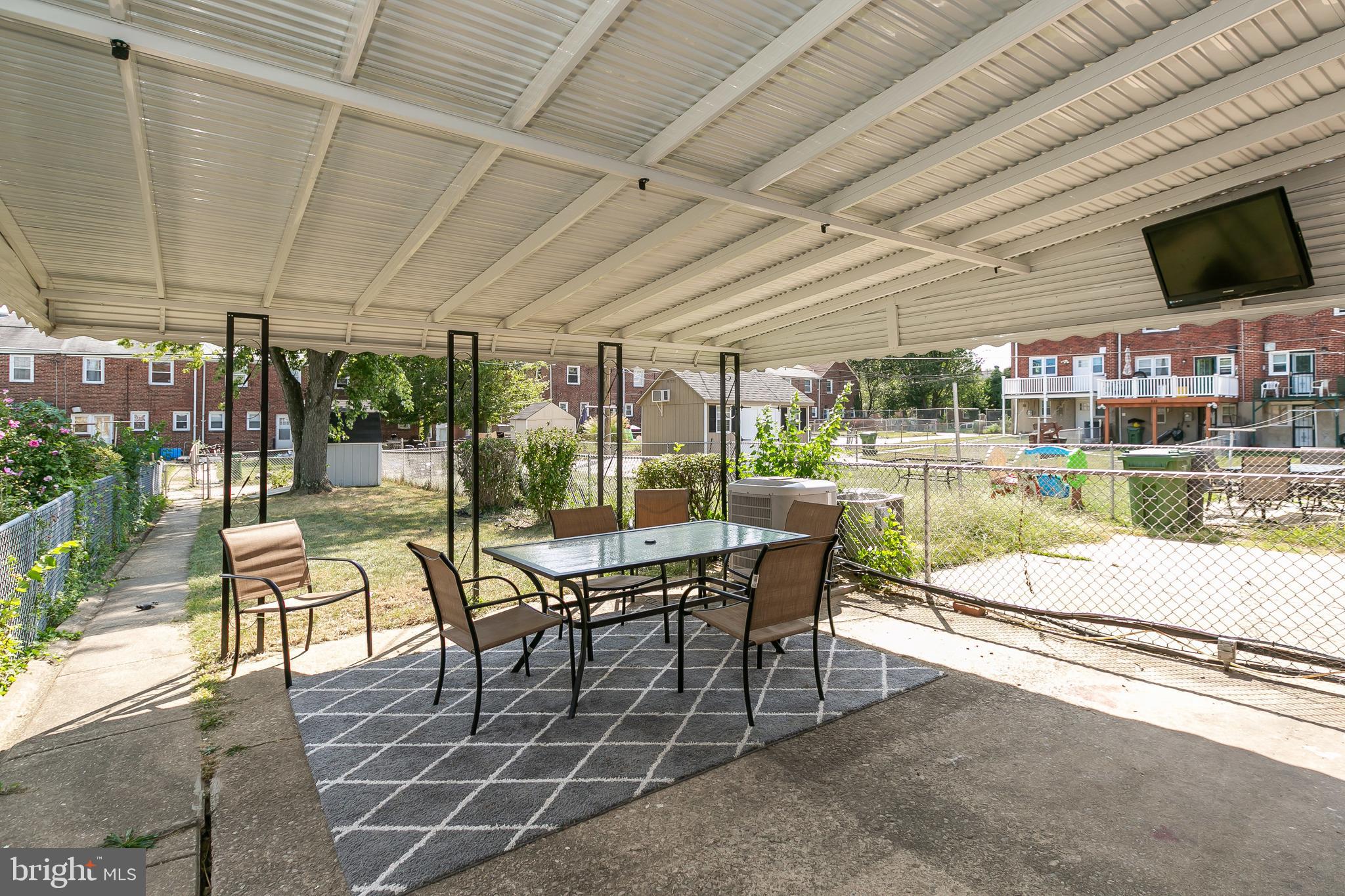 4921 St Gemma Road Baltimore, MD 21229 - Photo 32 of 33 a outdoor space with lots of table and chairs