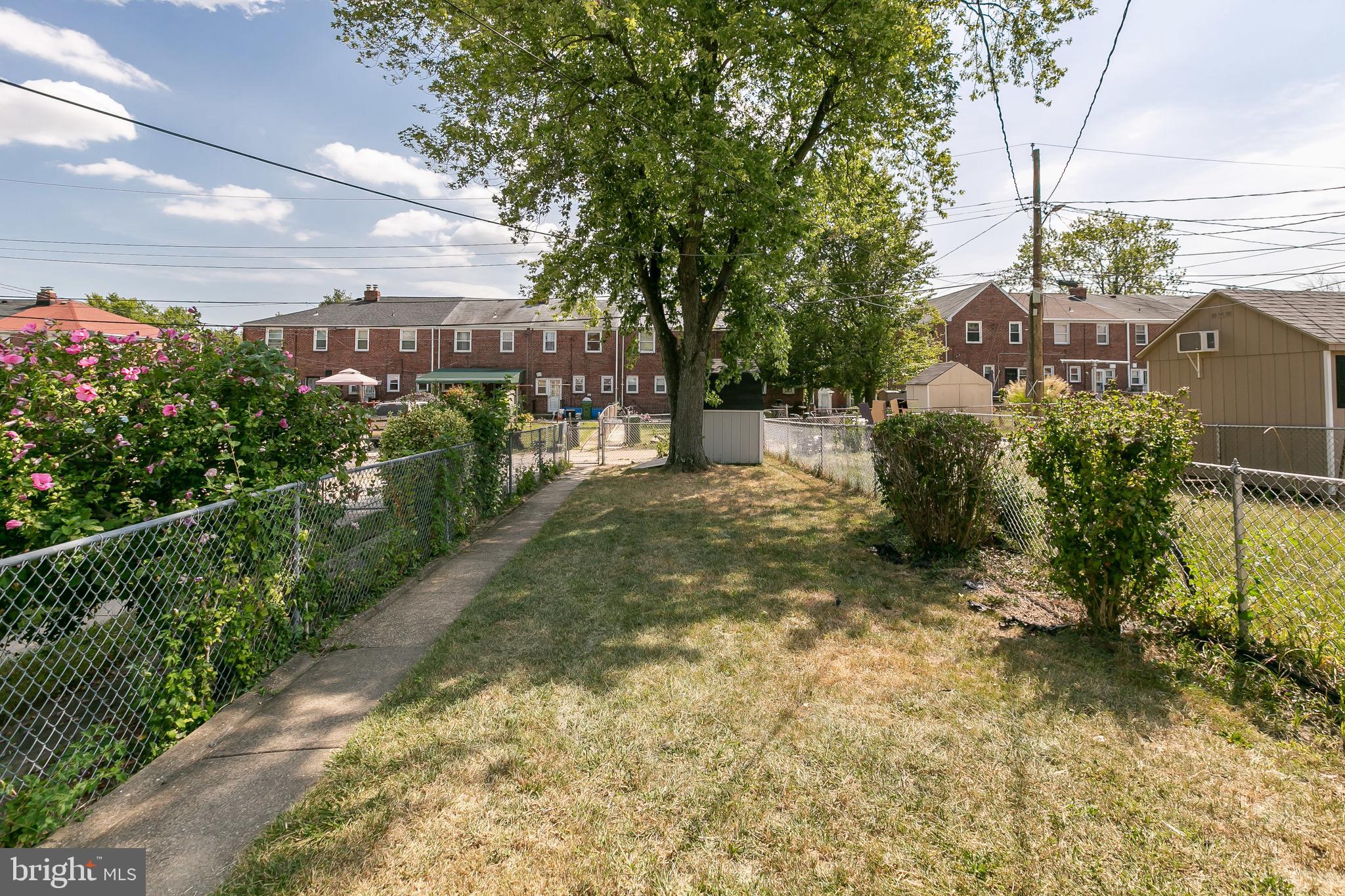 4921 St Gemma Road Baltimore, MD 21229 - Photo 33 of 33 a view of a yard with plants and large trees