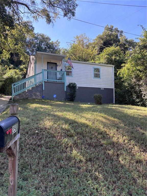 250 Morris Brown Avenue Northwest Atlanta, GA 30314 - Photo 2 of 8 a view of a house with a yard