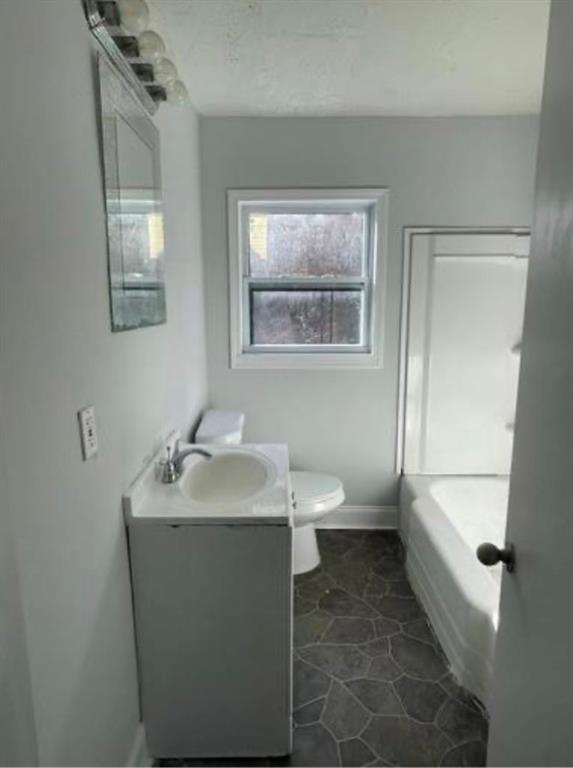 250 Morris Brown Avenue Northwest Atlanta, GA 30314 - Photo 4 of 8 a bathroom with a sink a toilet and shower
