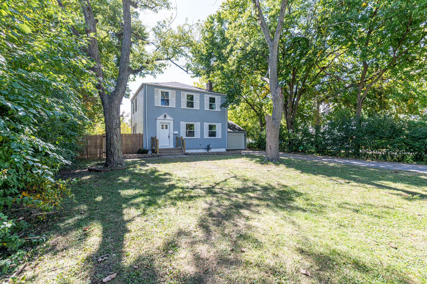 2845 Birch Road Homewood, IL 60430 - Photo 2 of 36 a house view with swimming pool in front of it