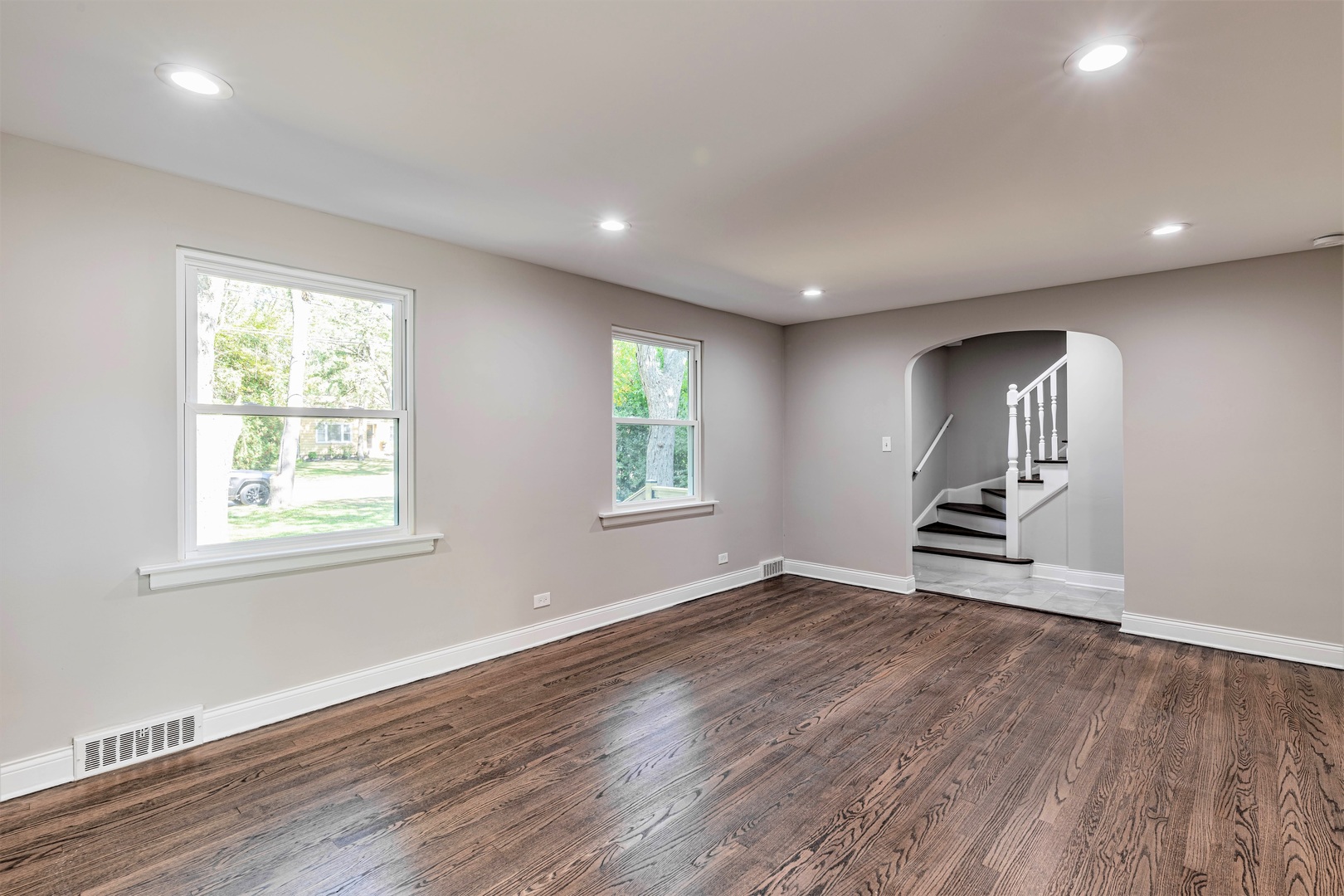 2845 Birch Road Homewood, IL 60430 - Photo 6 of 36 an empty room with wooden floor and windows
