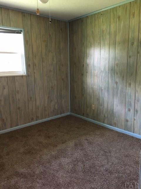 3996 Cotton Road Pace, FL 32571 - Photo 9 of 17 a view of an empty room and window