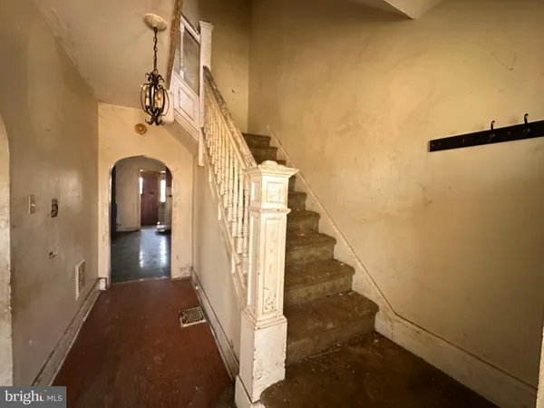 a view of a hallway view with staircase
