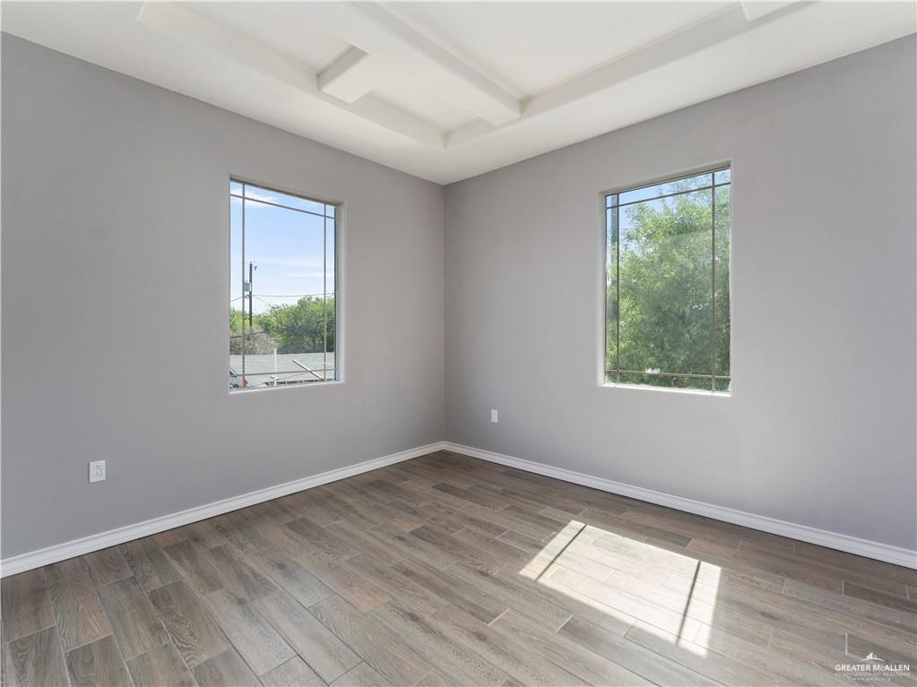 504 Benito Street Rio Grande City, TX 78582 - Photo 16 of 26 an empty room with a window