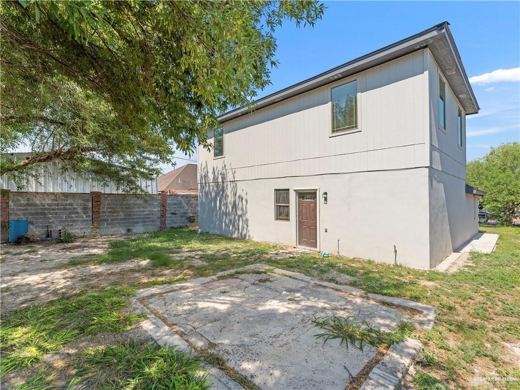 504 Benito Street Rio Grande City, TX 78582 - Photo 26 of 26 a view of a white house with a yard