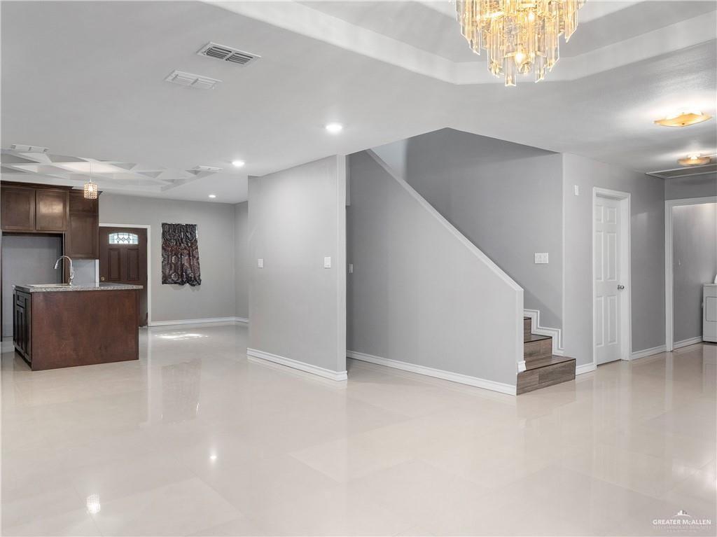 504 Benito Street Rio Grande City, TX 78582 - Photo 4 of 26 a view of a livingroom with furniture and an entryway